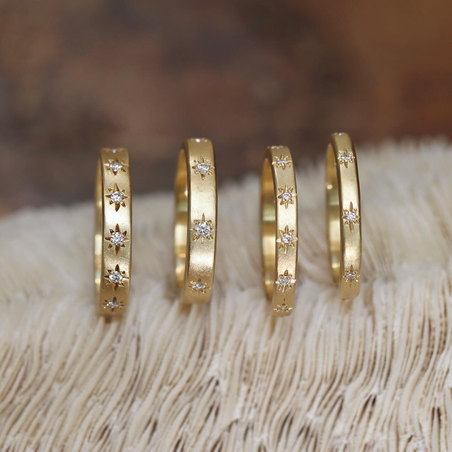 Our starry sky bands are available in four beautiful iterations. These classic rings are a dreamy nod to the past featuring a Victorian era star-set pattern of diamonds on a thoroughly modern square edge gold band. 

Our starry sky bands make for a t