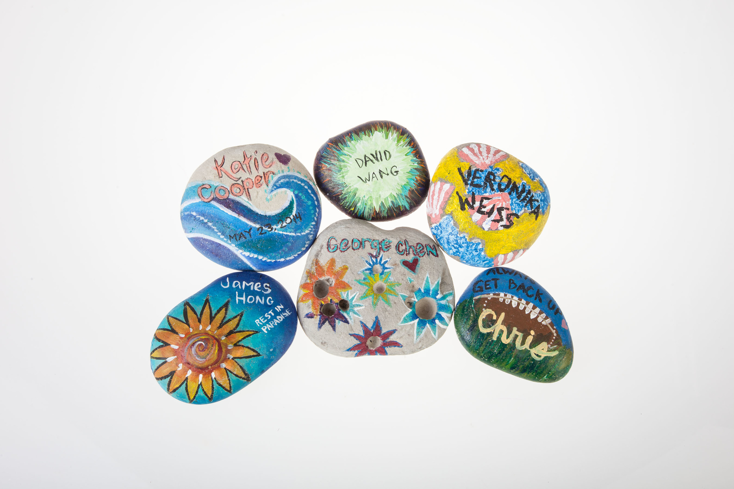 Painted Rocks left at memorial sites in Isla Vista. Photographed by Claire Bredenoord.