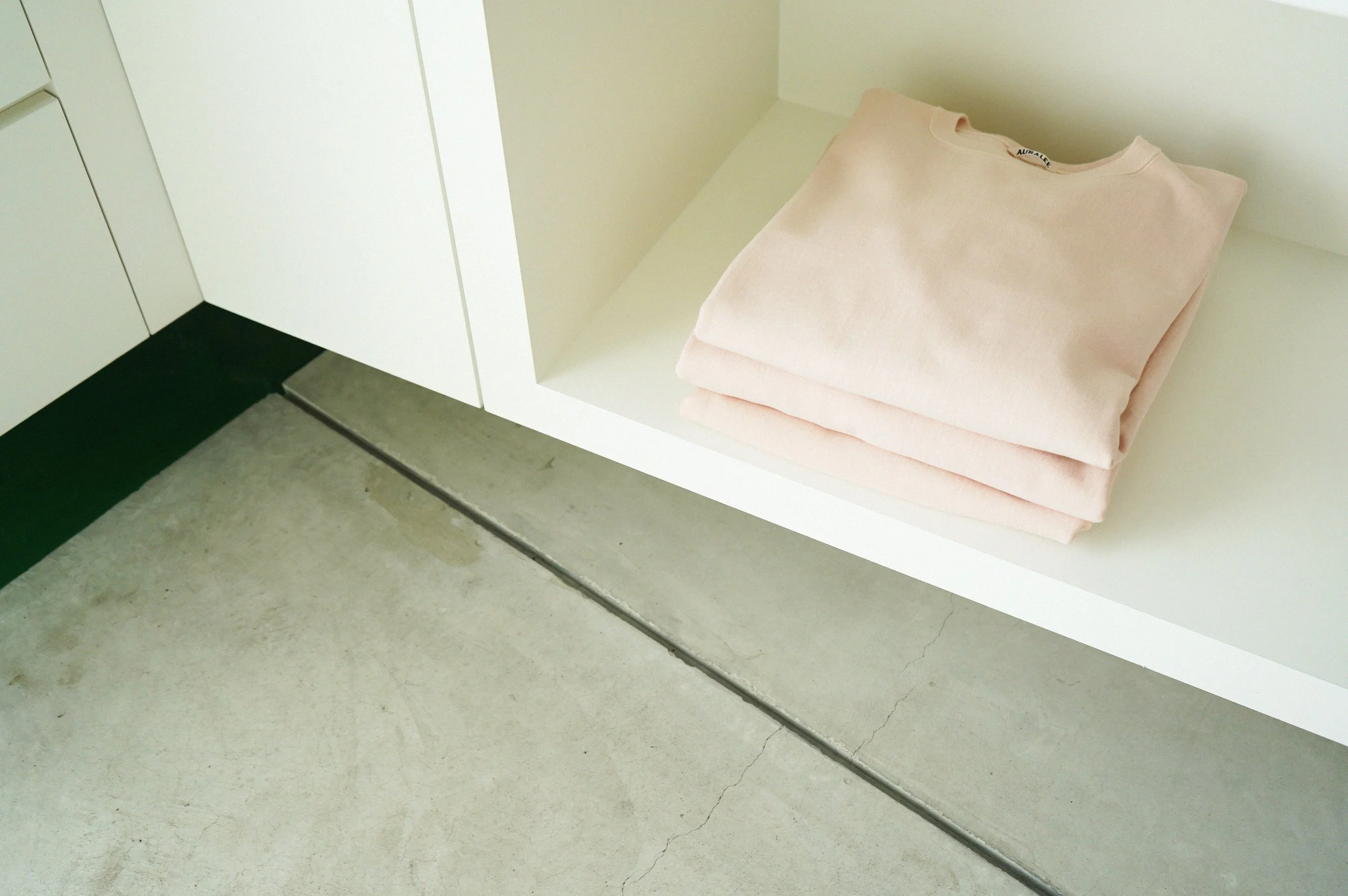 ピンクのスウェット