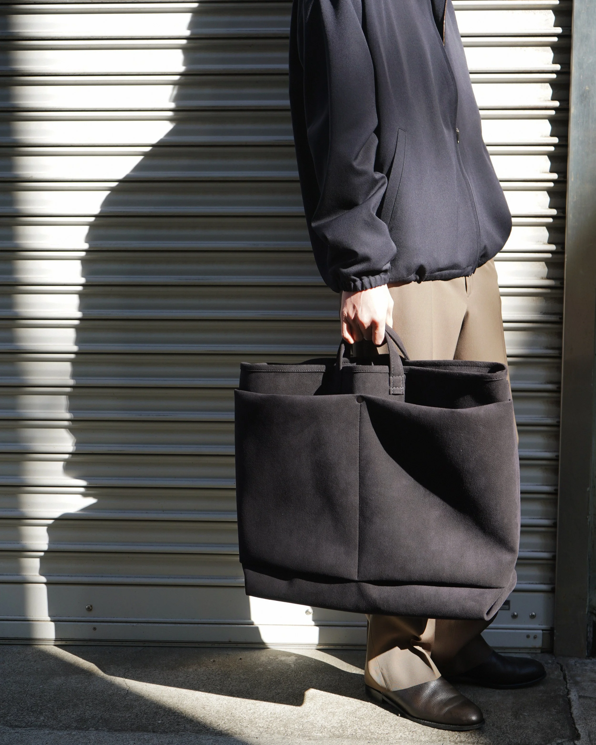 This is a(n) × TF : Base Tote Ultrasuede® (exclusive)