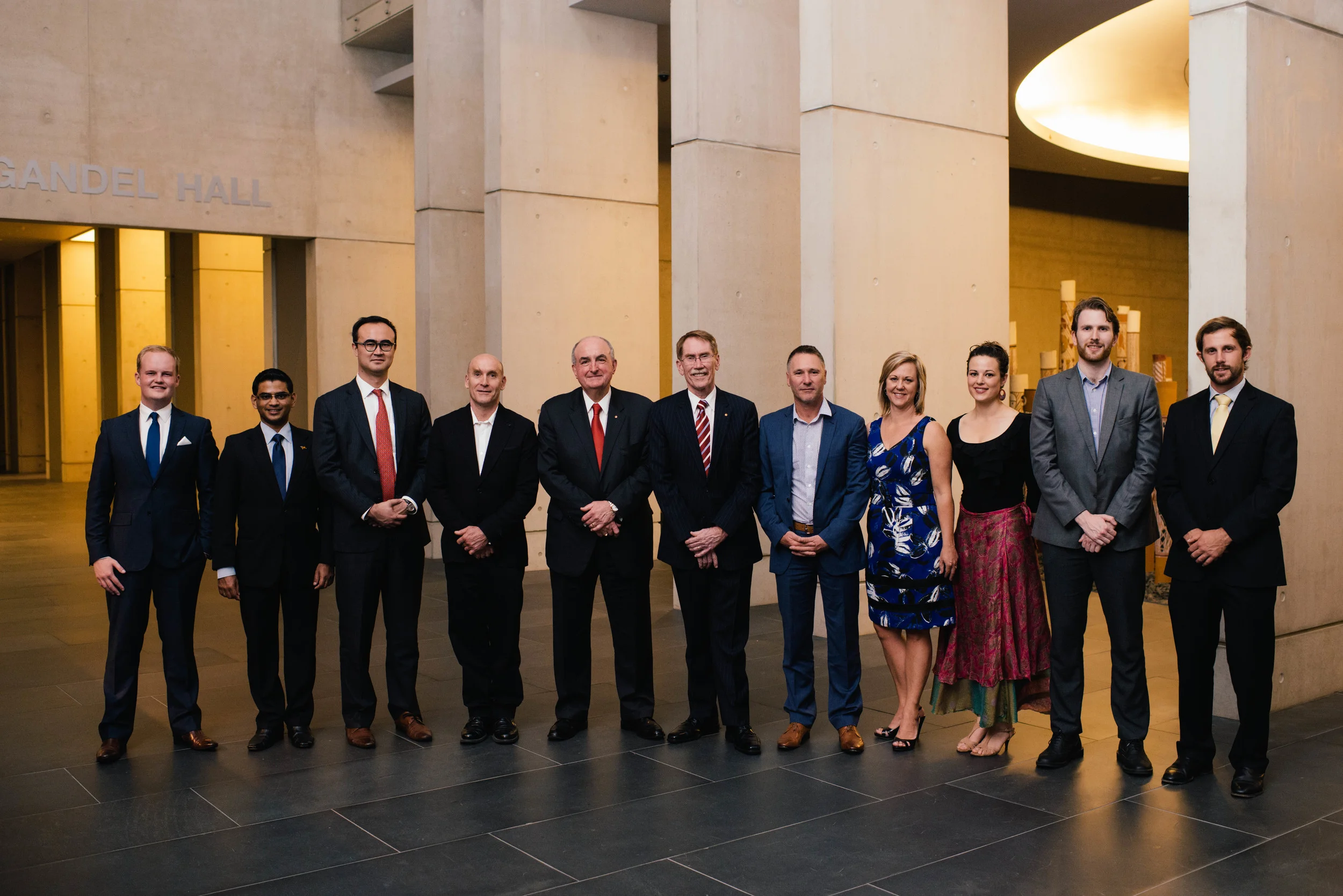 (L to R): Ben Duggan, Arjuna Mohottala, Henry Makeham , Robert Foster, Professor Michael McRobbie, Vice-Chancellor Professor Ian Young, Phillip Williamson, Michelle Melbourne, Jessica Avalon, Robert Wiblin, and Bradley Carron-Arthur. Photo by Adam Da Cruz.
