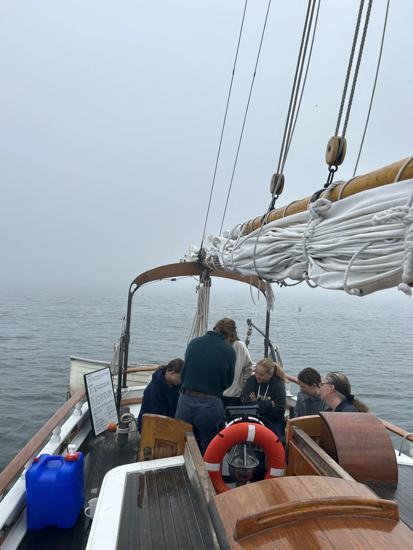 students learning by helm fog.jpg