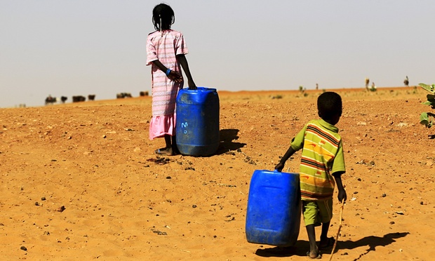Two children fleeing from the violence in Sudan’s East Jebel Marra reach the Zam Zam camp for displaced people. Credit: Mohamed Nureldin Abdallah/Reuters (Source: The Guardian)