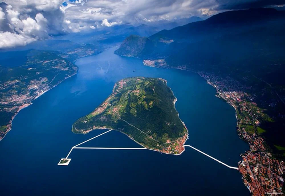 The floating piers as seen from the sky, linking two islands to the shore. Credit: Citynews-milanotoday.stgy.it ( full link )