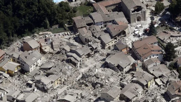 Aerial view of the historic town of Amatrice showing earthquake aftermath. Credit: AP Source: BBC News