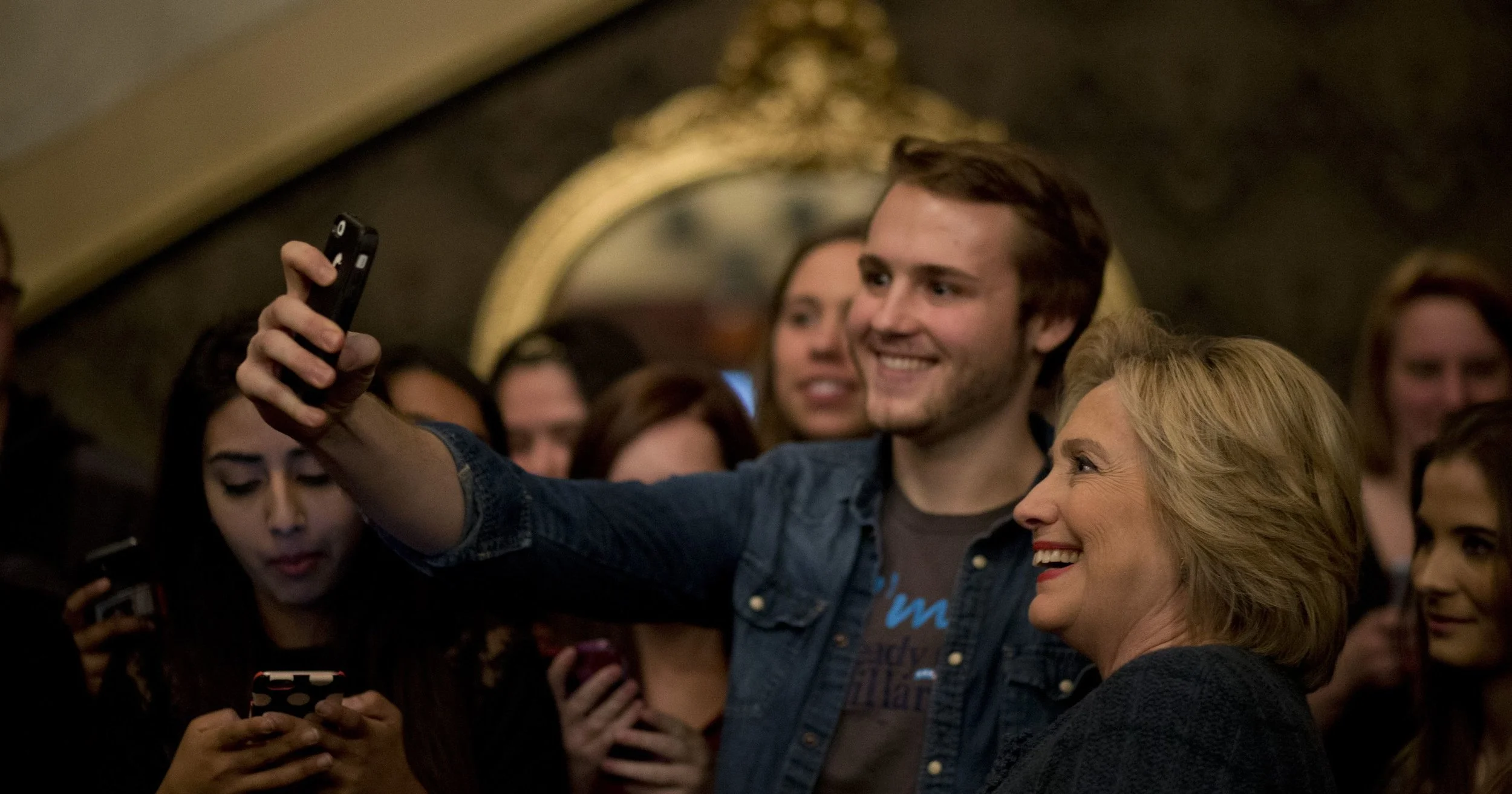 Democratic presidential candidate Hillary Clinton takes a selfie with a supporter in Sioux City, Iowa. Cover credit: Jae C. Hong/Associated Press Source: LA Times 