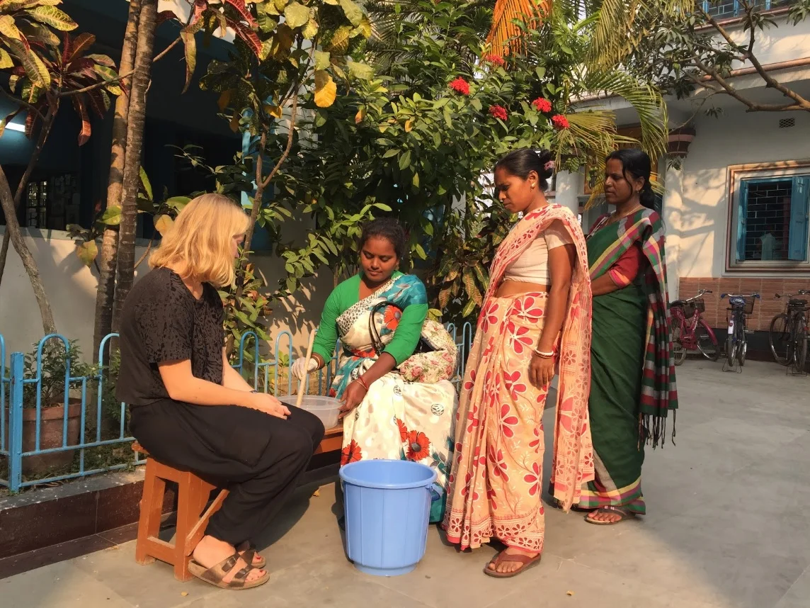 Indian women and Hanna Lekedal during a soap-making workshop Credit: Ambra Dentella