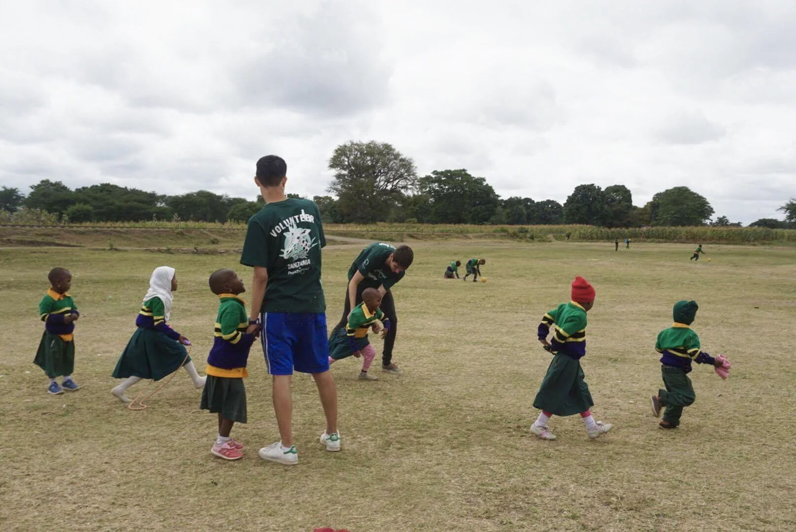 Volunteers playing with students in Arusha, Tanzania