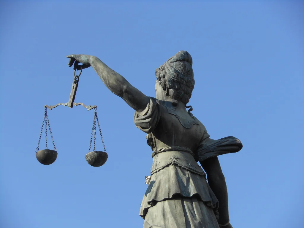 Scales of Justice in Frankfurt, Germany Credit: Michael Coghlan / Flickr
