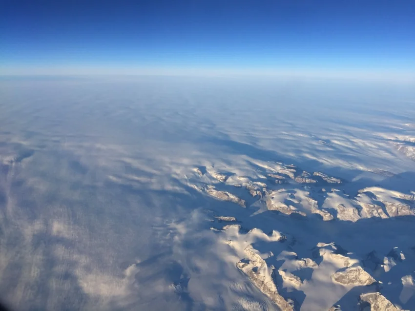Where mountains and rocks morph into a blanket of snow, South Greenland