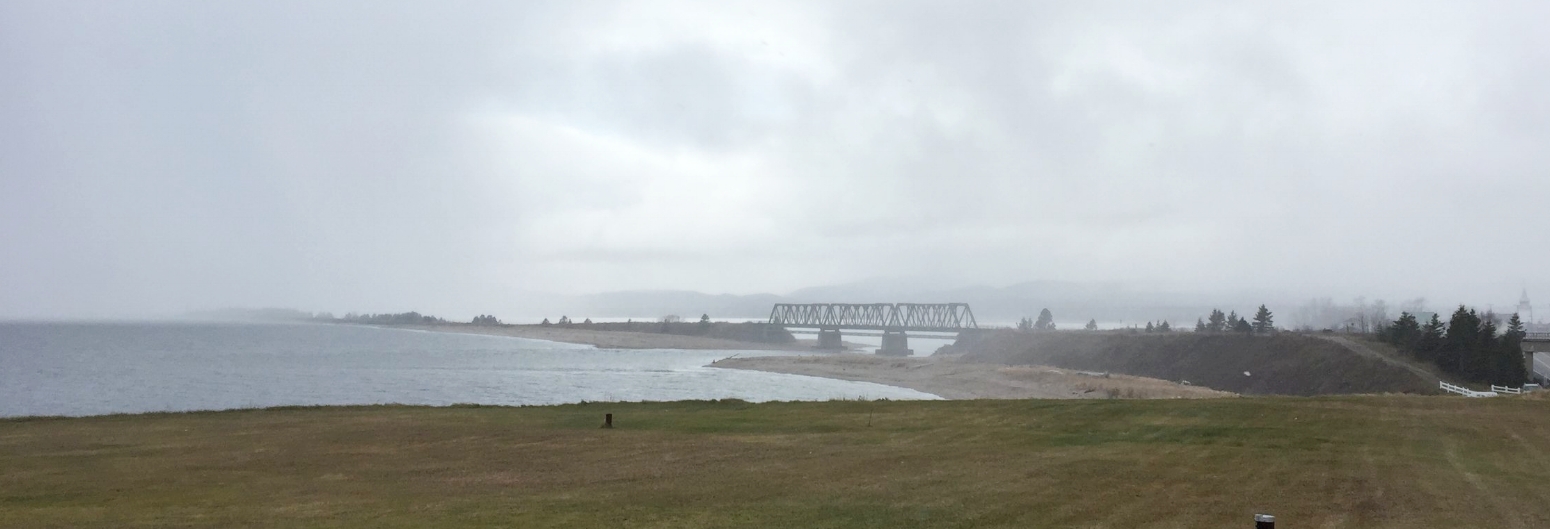 Looking back onto he road to Percé.