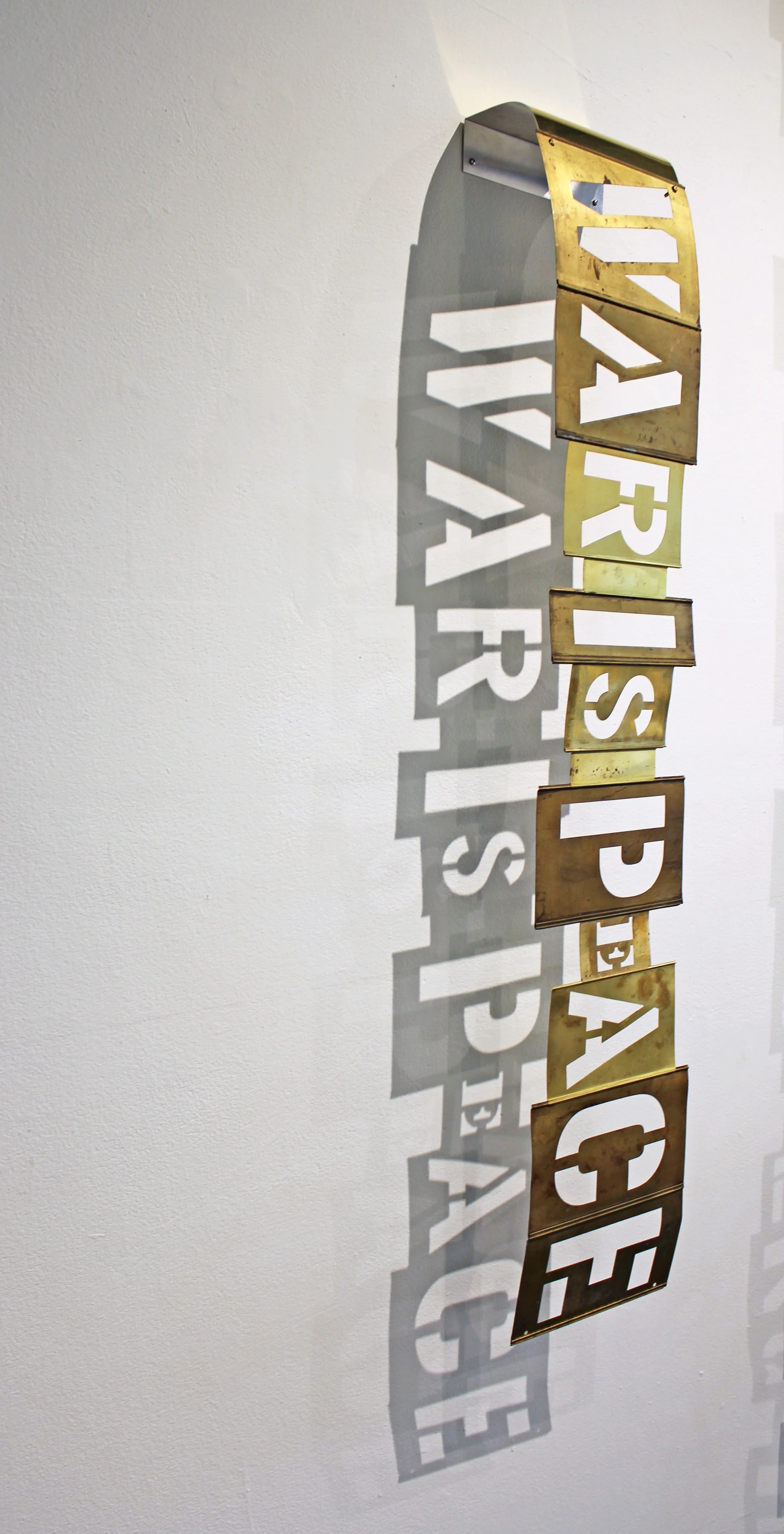 Orwellian stele (war is peace)