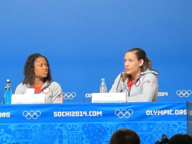 In the days before they compete, teams come to the main press center to talk to reporters. There's usually a group press conference, then a rush of reporters to talk to the individual athletes afterwards. Above are women's bobsledders Lauryn Williams and Lolo Jones, both of whom have also competed in track and field at the Summer Olympics.