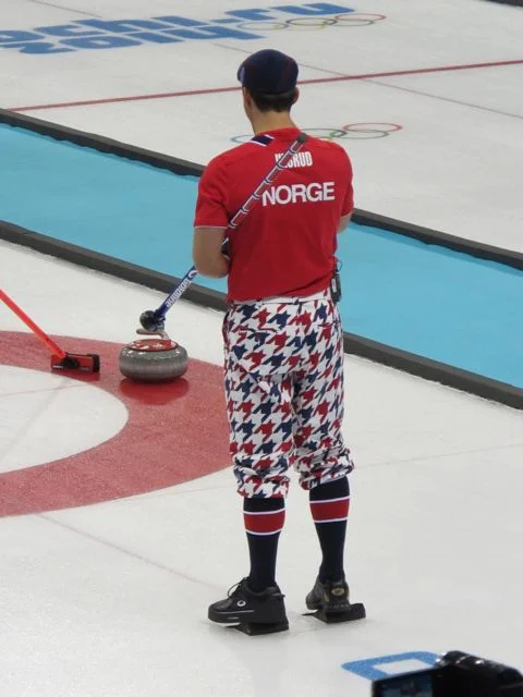Any of you remember the late golfer Payne Stewart and the way he dressed? His spirit is alive and well on the Norwegian curling team.