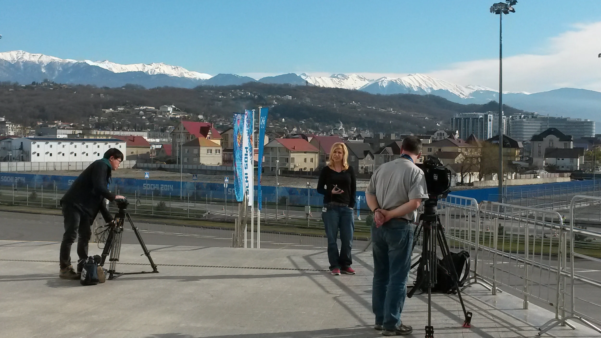 One of the rules of the Olympics is that only broadcasters who pay for the rights are allowed to shoot video/TV in the venues. That leaves other TV crews searching for places that LOOK like the Olympics but are located elsewhere. I feel as though every time I walk somewhere in the Main Press Center (including this patio area in the back), I pass a TV reporter doing a standup: ("And I can't BELIEVE that I don't even have to wear a jacket here at the WINTER Olympics…").