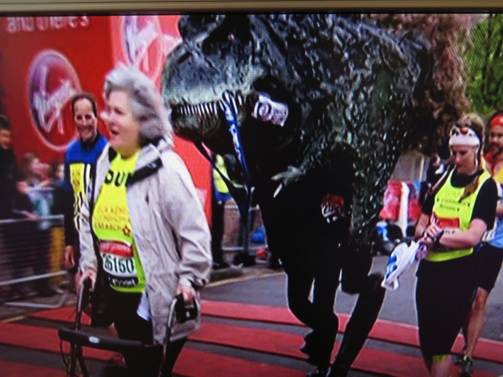 Ian Bates, 44, from Crawley, England, ran wearing a T-rex costume that weighed 84 pounds.