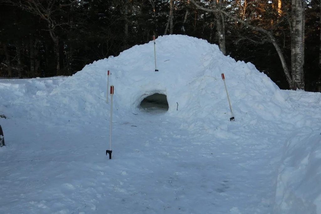 The quinzhee hut became Chuck’s nighttime home.