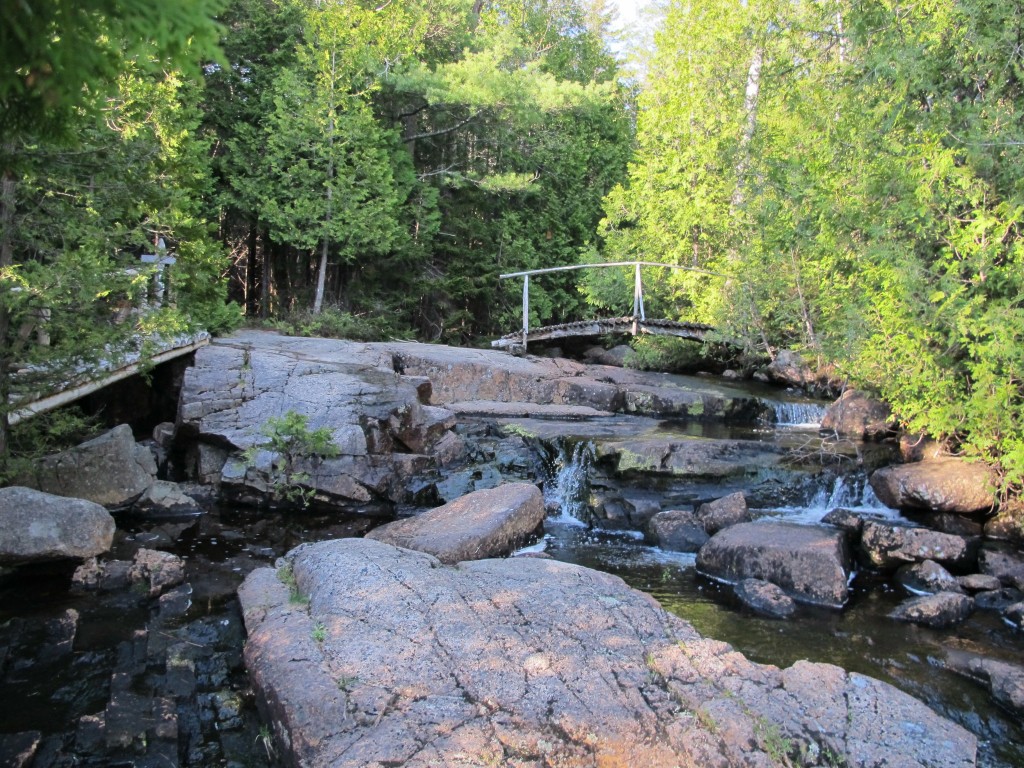 This is the spot at which the stream drops significantly and flows into Lower Hadlock Pond.
