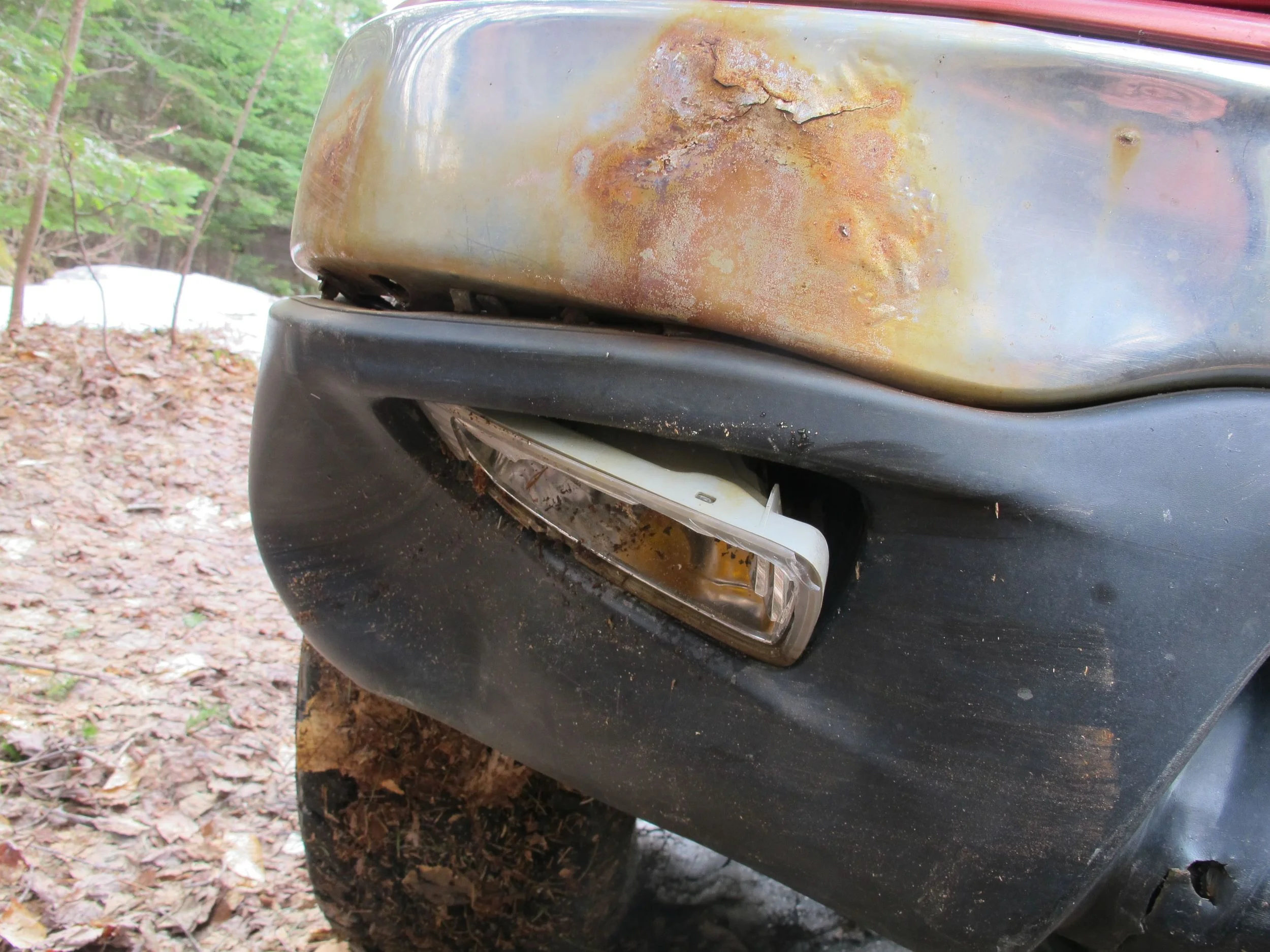 Oops. A front blinker on Bernd's truck got broken by a hidden stump.