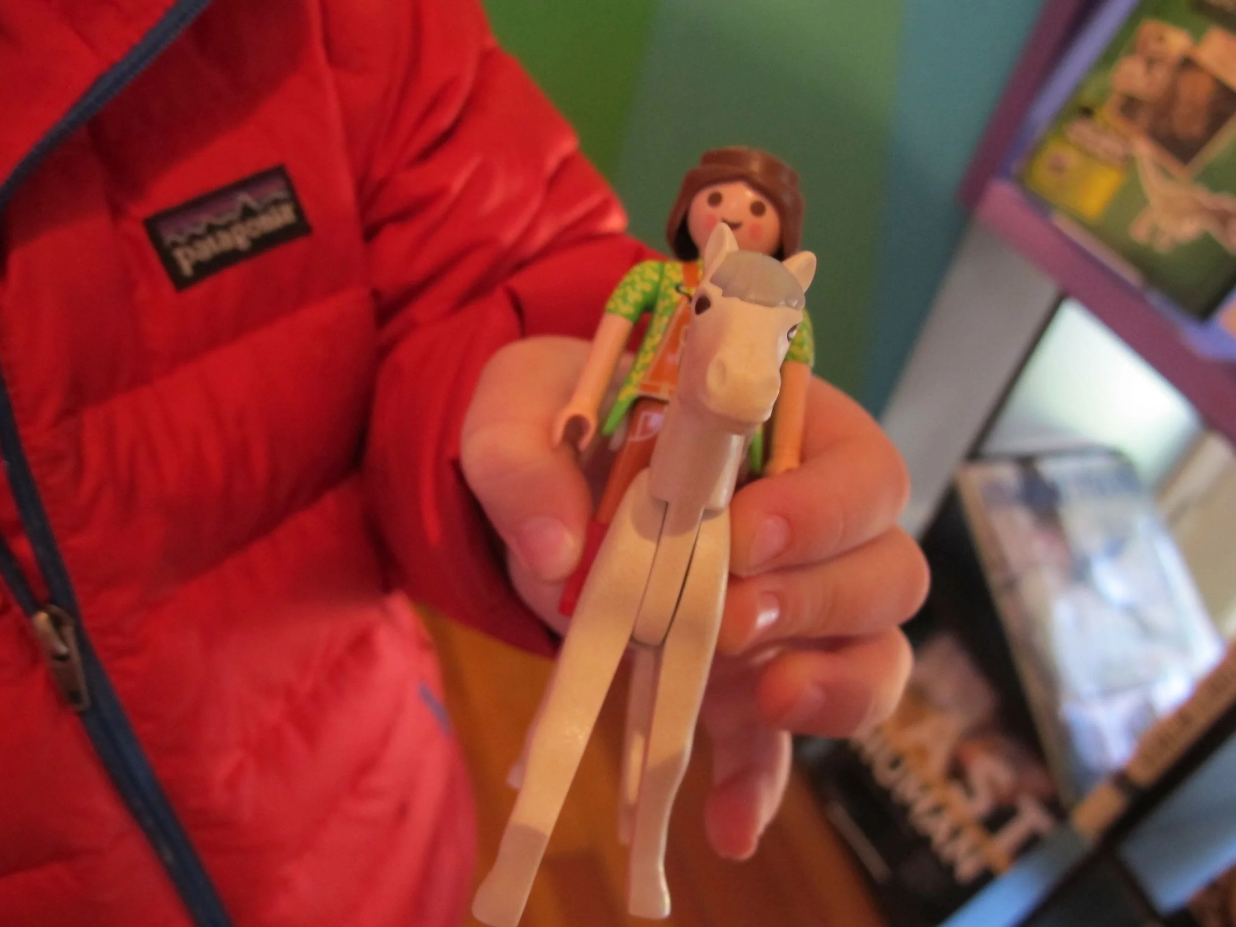 I have to repeat a story I mentioned on the Notebook's Facebook page. The youngest Moon and Sun room painter was four. She brought this toy. I asked her who the rider was. Maria Zuber, the girl said shyly. Wow, I thought. Maria Zuber is an MIT professor and one of the world's foremost planetary scientists. It turned out that a past visit to the Notebook had helped spark an insatiable interest in science in this potential future Maria Zuber, who loves watching the real Maria in a science video she has at home.