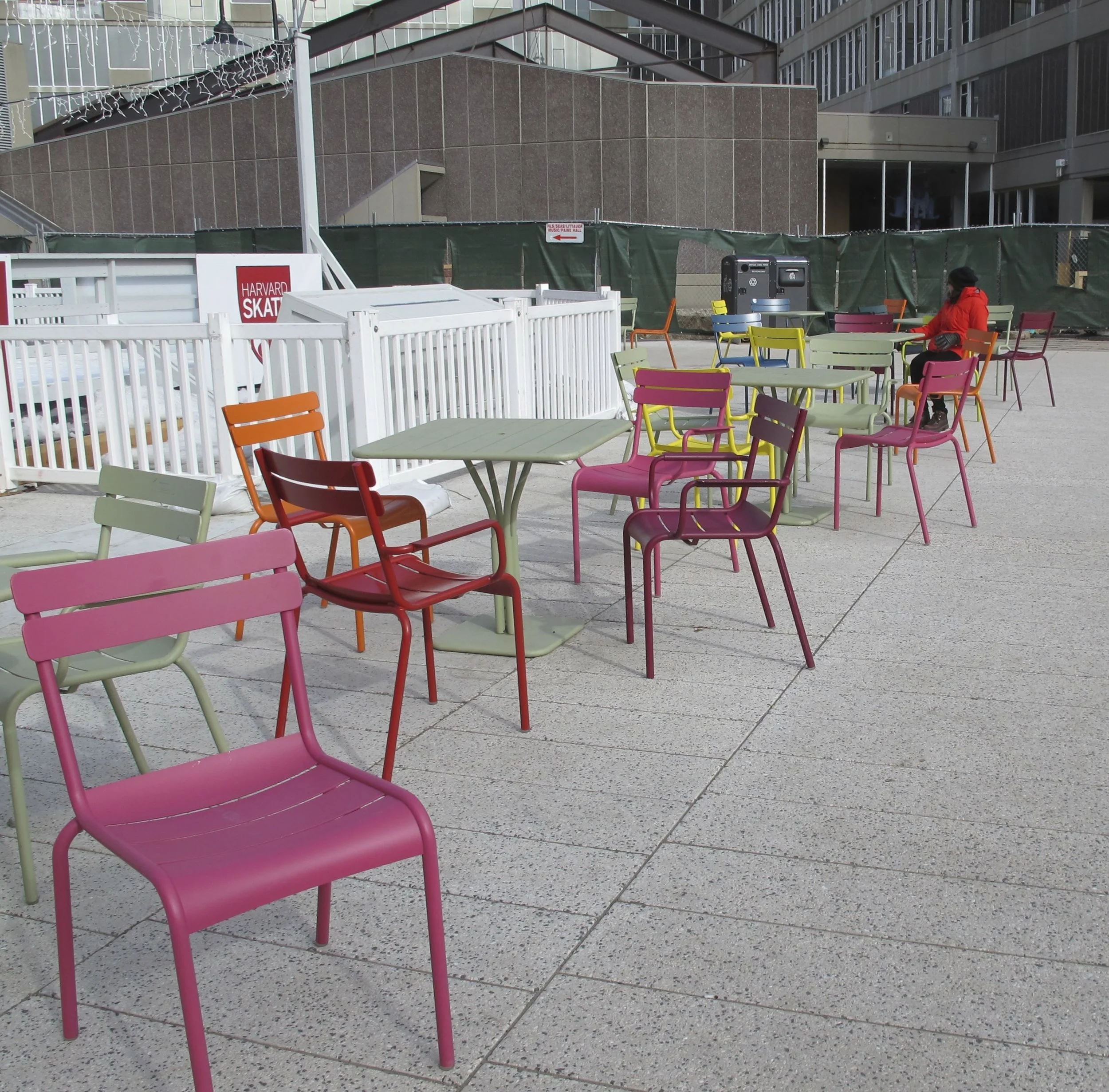 We wandered the Harvard campus quite a bit during our visit. Near the school's outdoor skating rink we saw some tables and chairs... and Pamelia saw a 13.7-billion-year spectrum waiting to happen. So we began moving everything around....