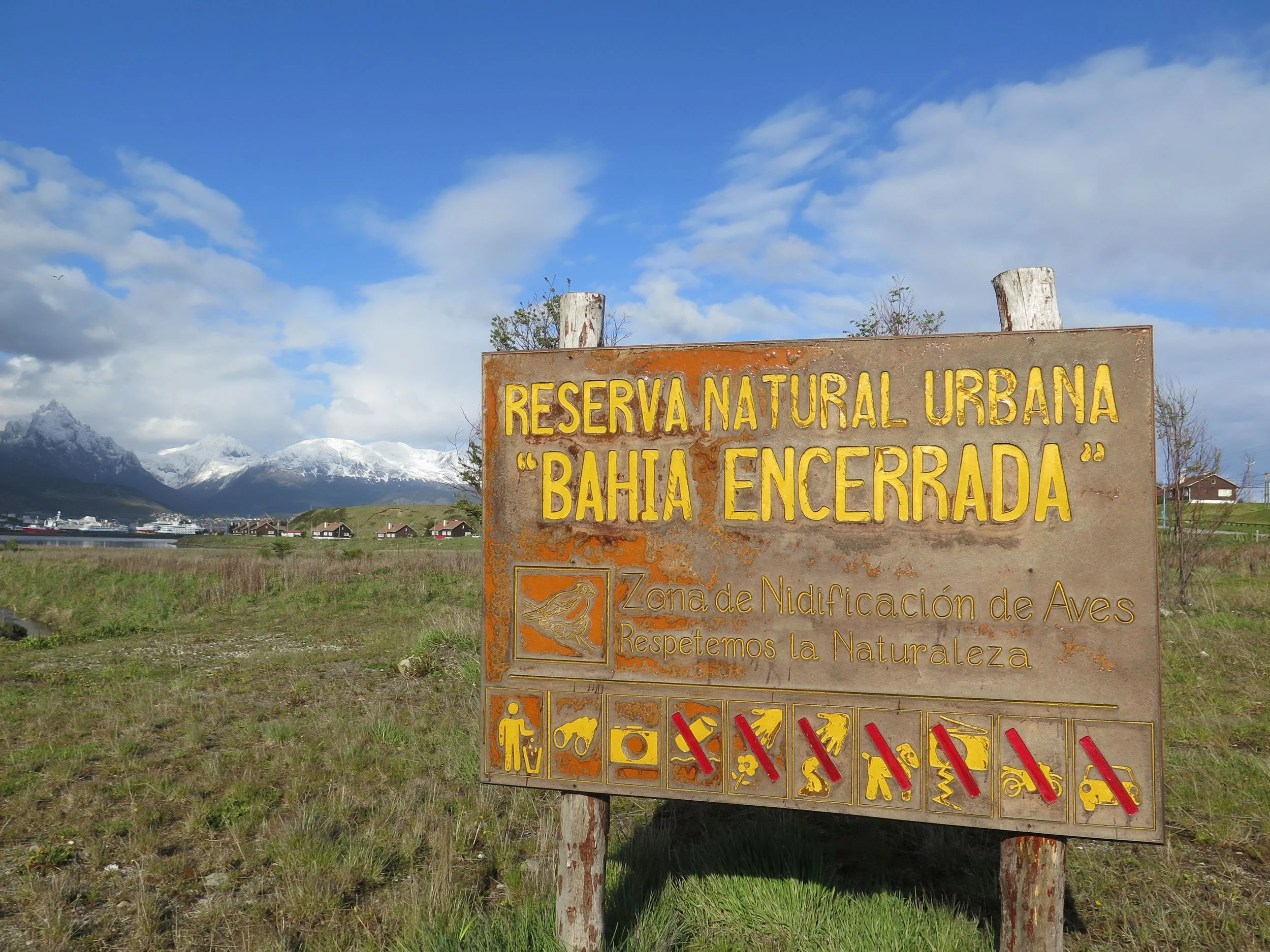 Note the no-dogs-allowed symbol on the sign by the bird reserve.