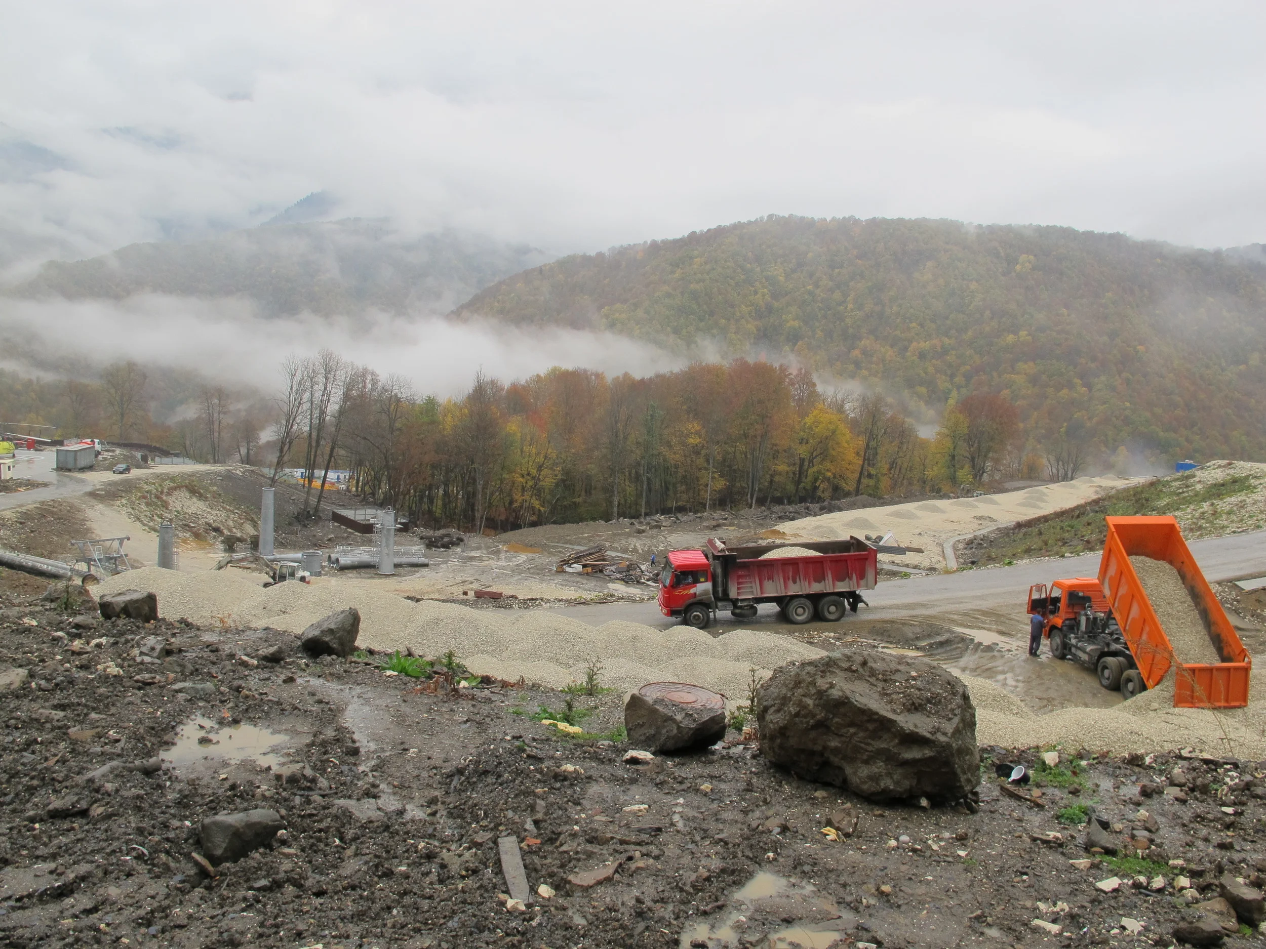 The Causasus Mountains are beautiful (and currently an autumn yellow) but roads and venues are being gouged out for the 2014 Games. Here’s the view from finish line of the Alpine ski courses.