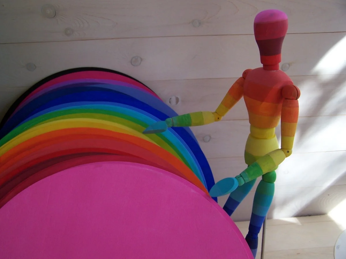 Who was that checking out the 24 display pieces in the works in Leanne’s studio in early October? It was one of several variations of a character that we've named HUEMAN—an embodiment of the 24 colors used to represent the 24 time periods in the history of the universe. You’ll be seeing a lot more of HUEMAN.