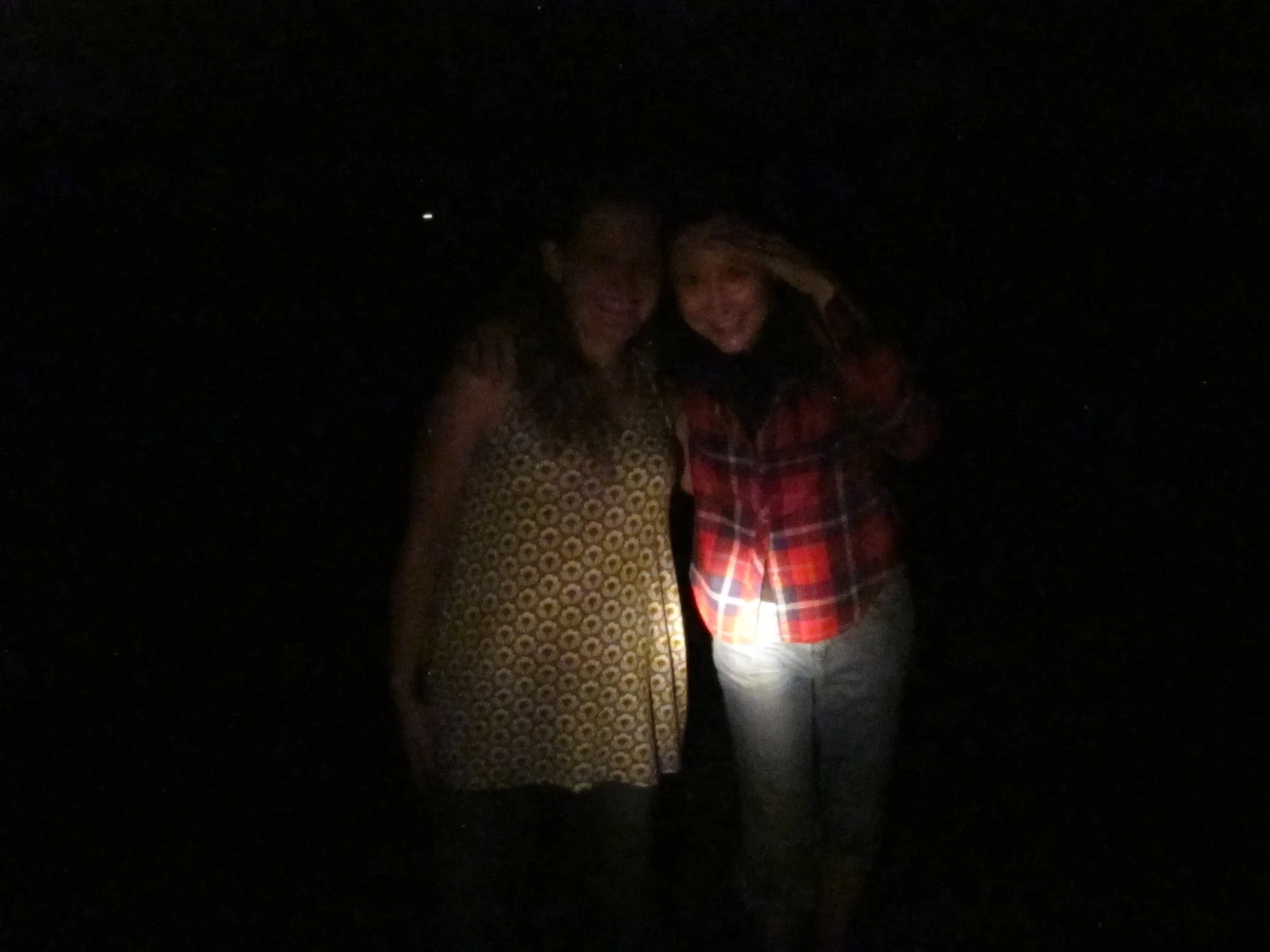 Two of our night explorers, Lisa and Pamelia, illuminated by flashlight, not phytoplankton.