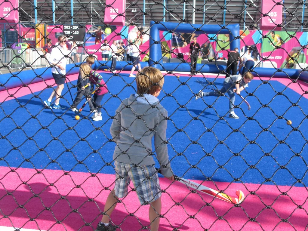 Outside the Olympic field hockey stadium is a mini-field on which kids can learn basics of the game—or just have fun.