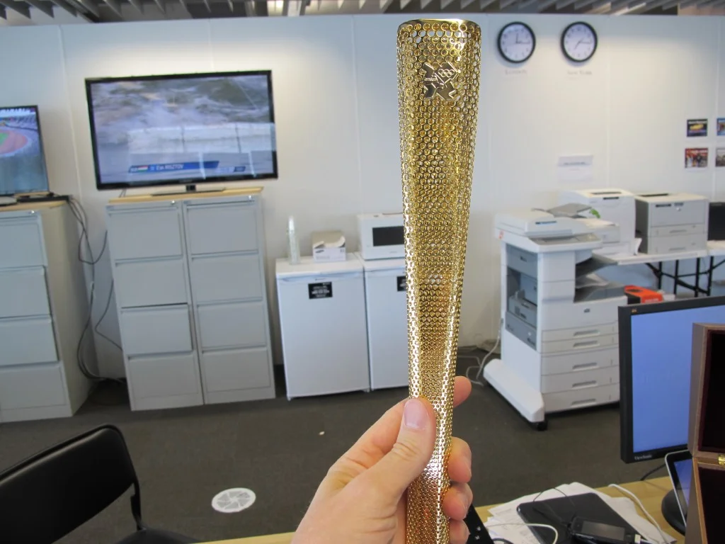 An international media group awarded replica Olympic torches to all journalists who have been to at least 10 Games. I failed to pick mine up, but I tested out a colleague’s in our office.