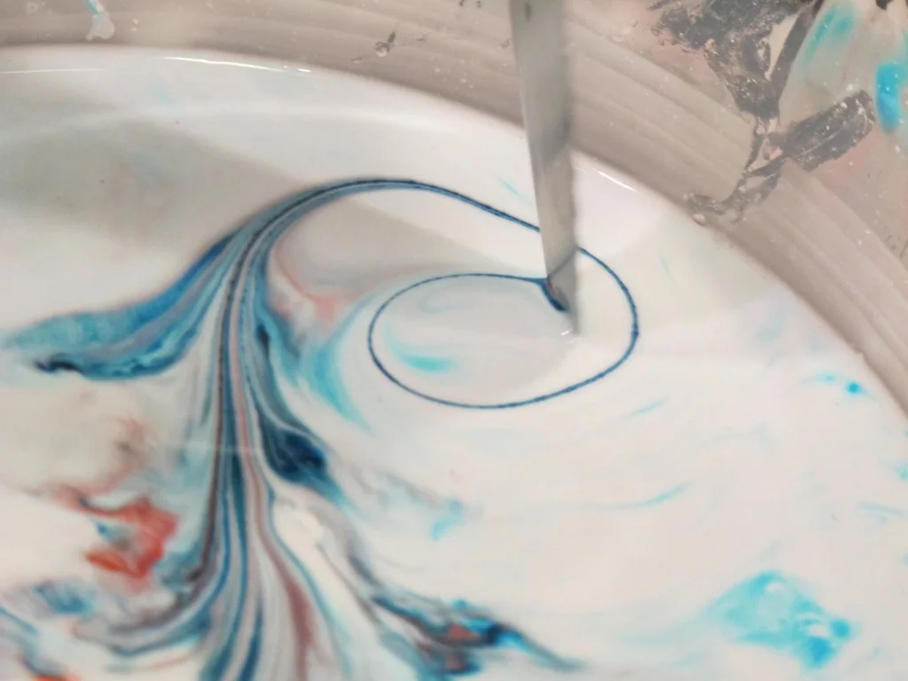 A pointed knife became a fine-haired paint brush.