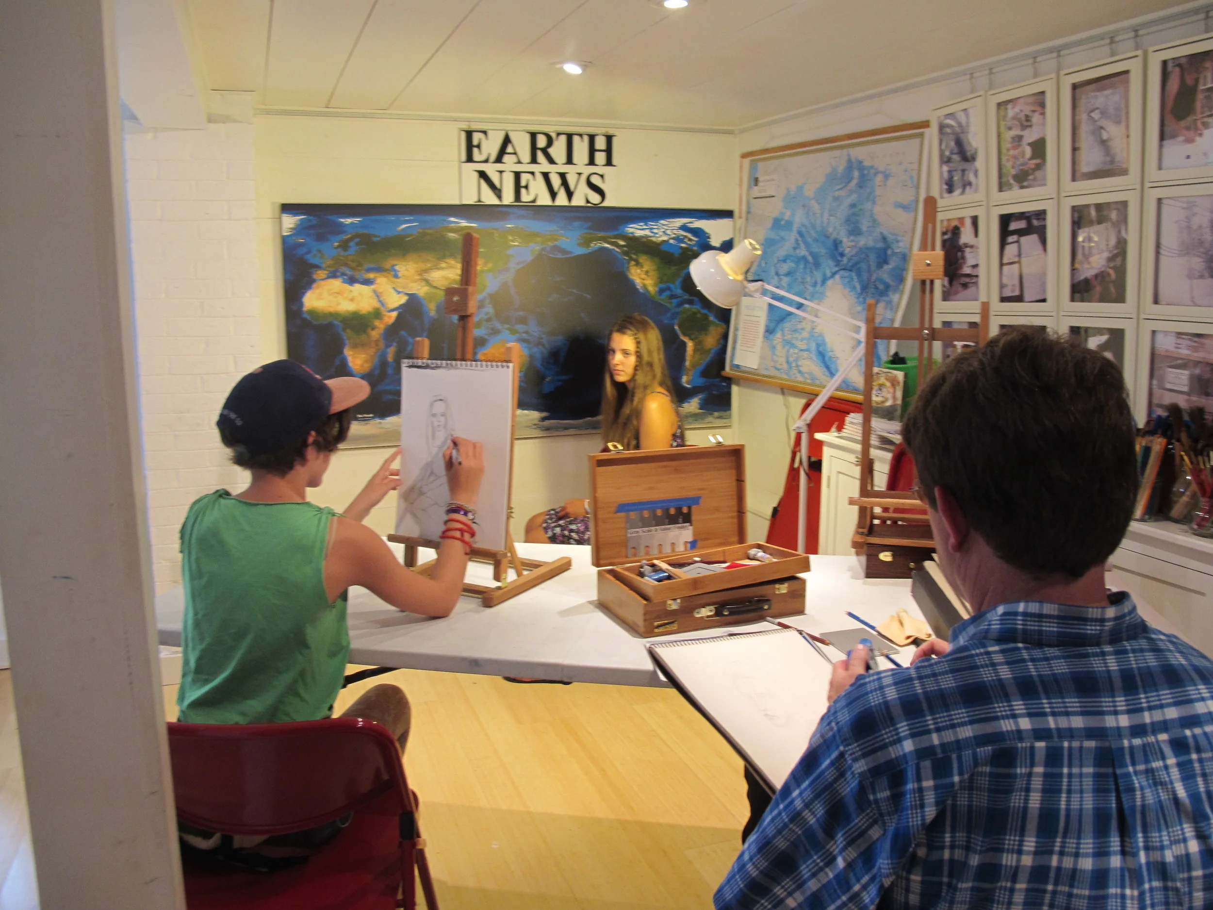 Part of a portrait workshop led yesterday afternoon by gifted artist and teacher Kathy Coe, who will be running our children's art workshops for only one more week before heading home.