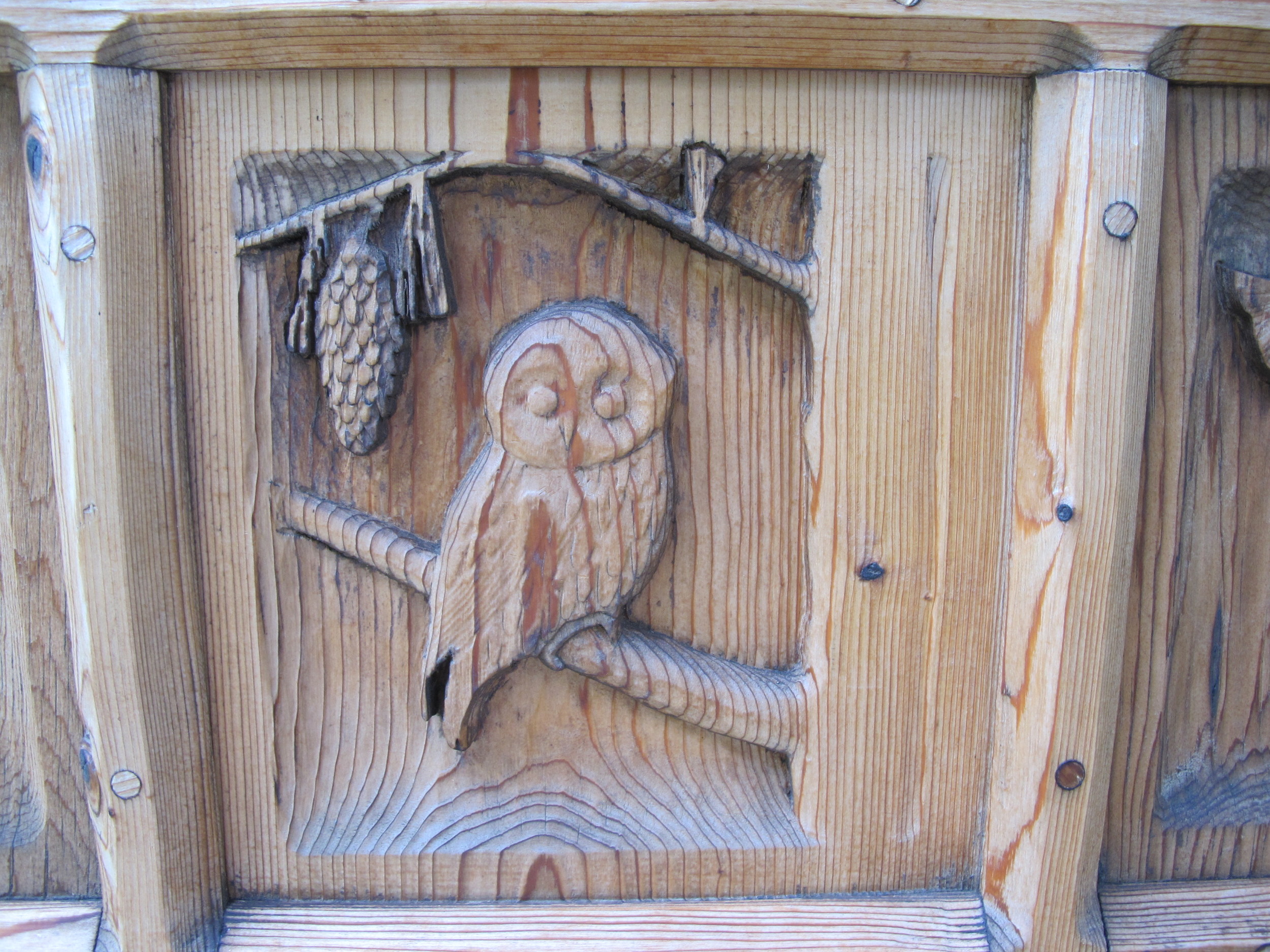 The door-like gates to Thuya are covered with exquisite nature carvings. The gates are one of Pamelia's favorite works of art on Mount Desert Island.