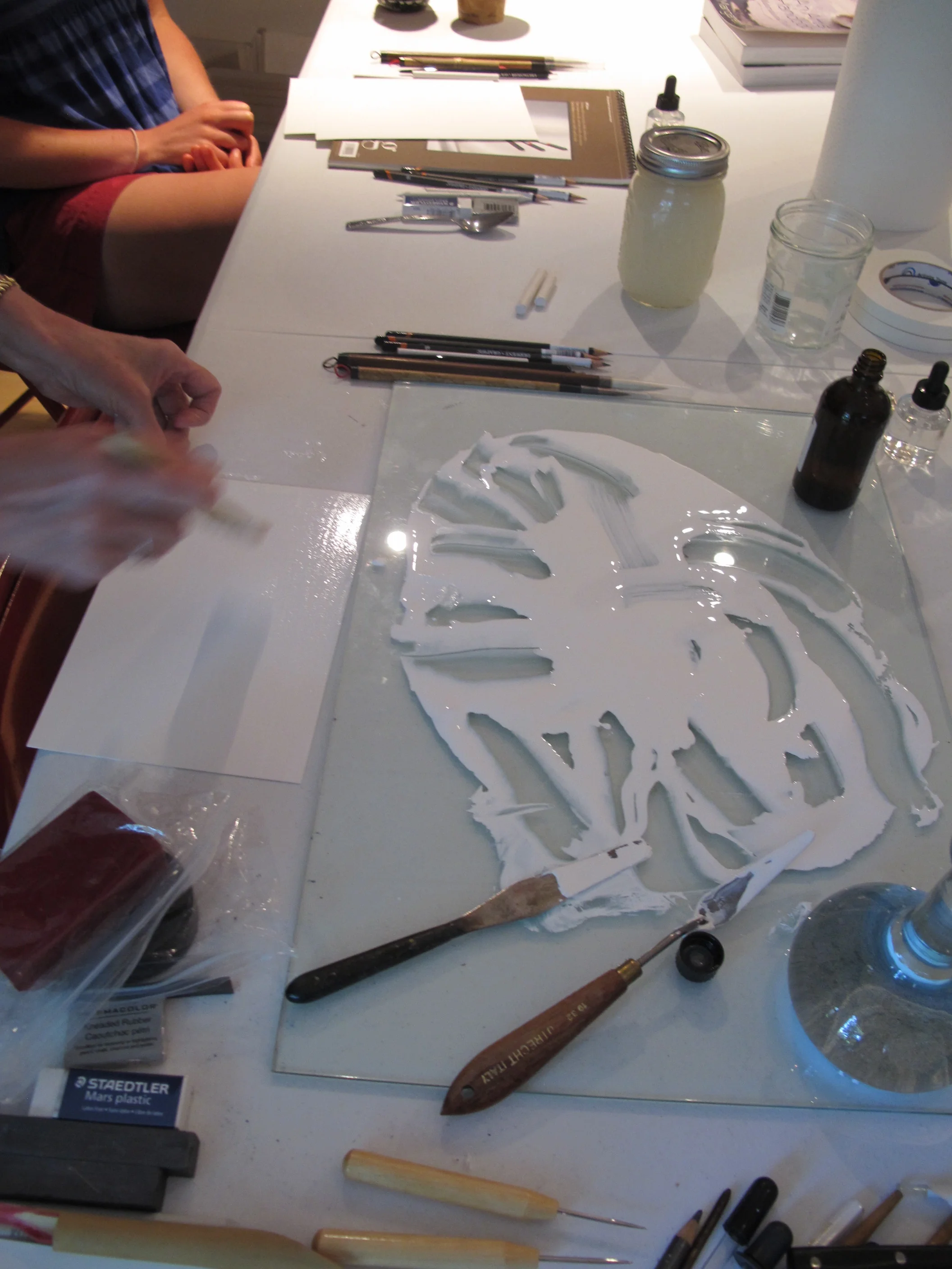 Preparing paper for use with silver point pens.