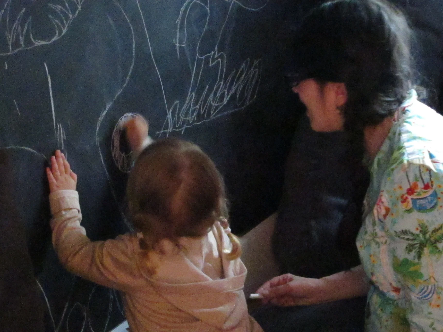 Thirty-two-thousand years later, humans are drawing on the Cave Room wall instead of the cave wall.