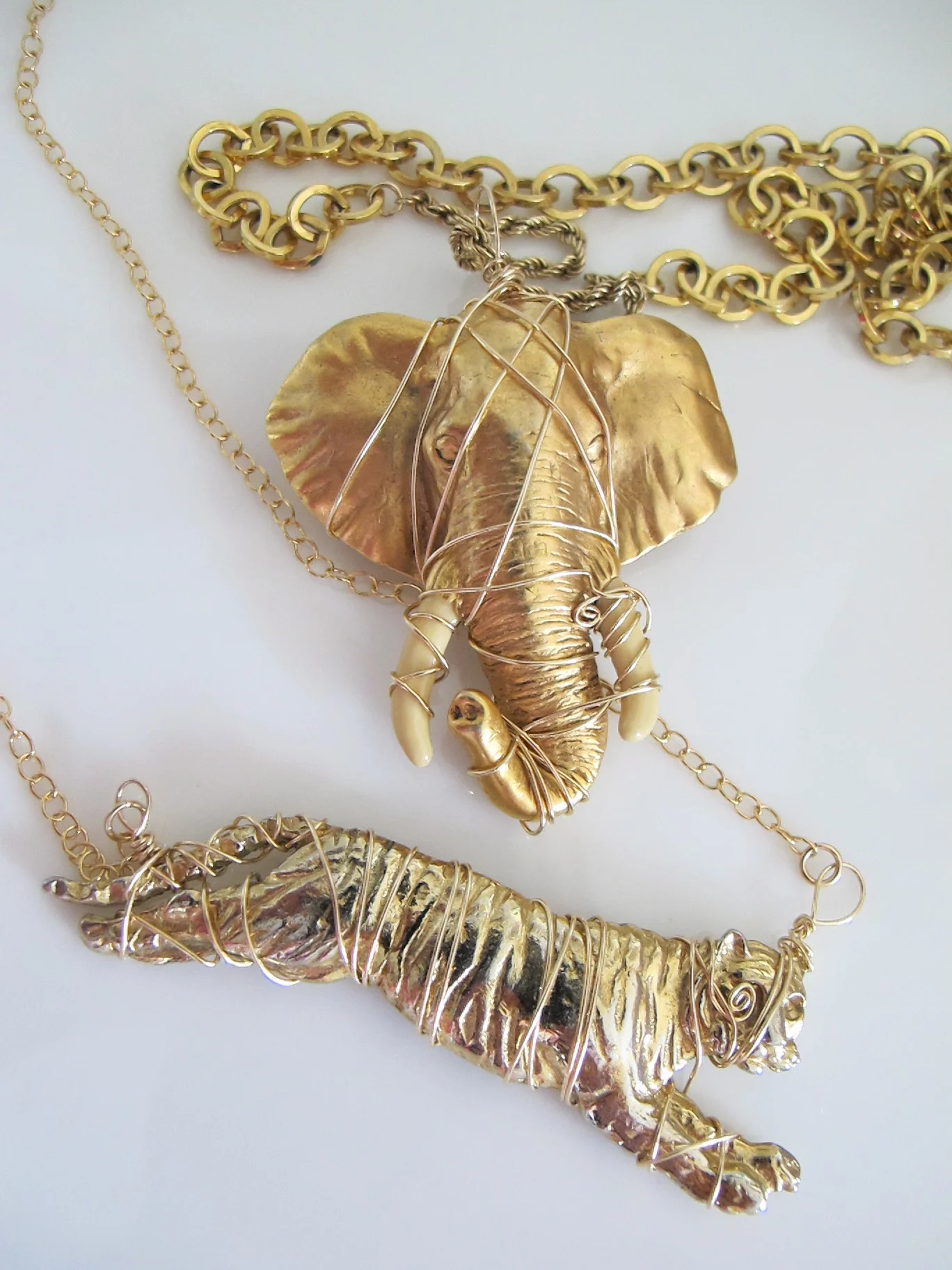Two of the one-of-a-kind endangered-animal pieces that Anne Woodman will be showing this Thursday at our next special event.