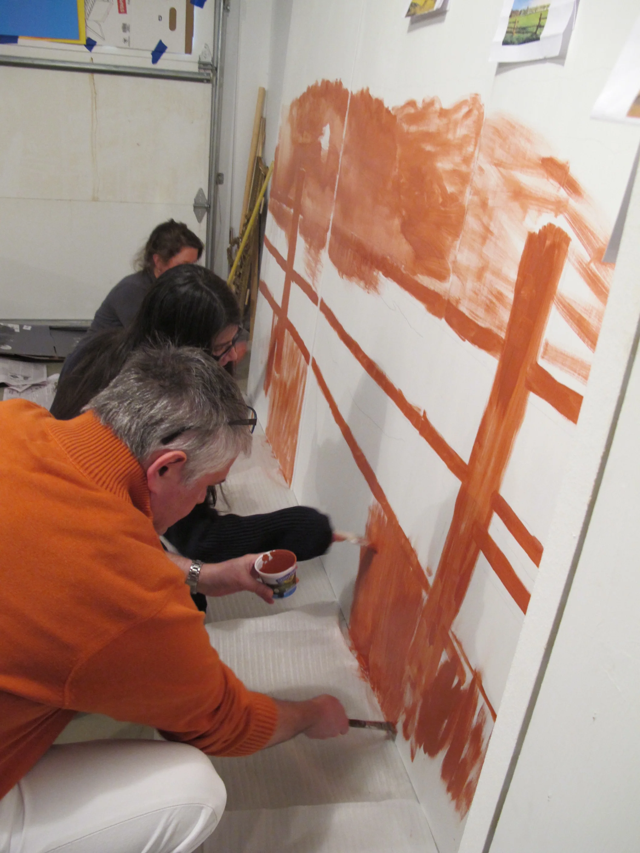 Hmmm...what's going on here? Could a Notebook installation be in the works? Friends Jowill Woodman and Betsy Loredo and Notebook whiz Haley Harwood were brushing up on their art skills the other day.
