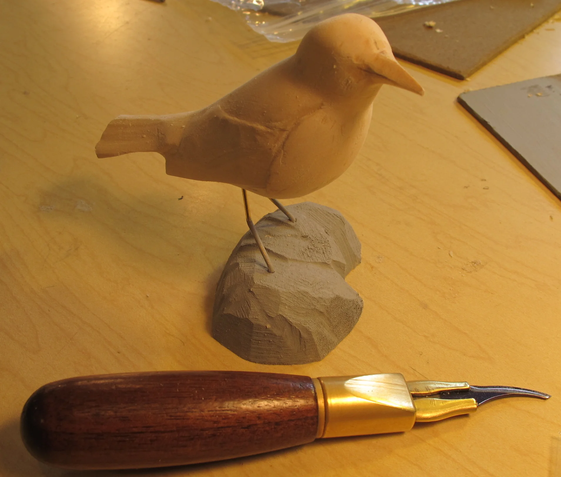 As an early Father's Day gift a couple of weeks ago I took my dad to master carver Steve Valleau's one-day bird-carving workshop at the Wendell Gilley Museum in Southwest Harbor, Maine. This is my day's effort—a black-throated blue warbler, minus the finishing touches and the paint. Carving is a great way to sharpen your eye as a naturalist because you have to define each detail with such precision. Without Steve's help, of course, my bird would have been far more, uh, abstract looking.