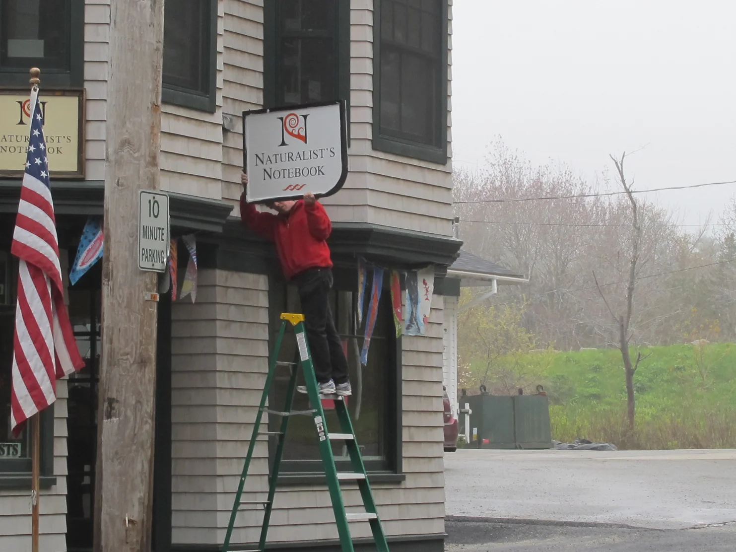 We've been working on a new sign to hang off the front of the Notebook but need a little engineering help in getting it up. At least I didn't fall off the ladder.