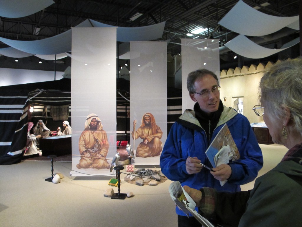 Behind me at the falconry exhibit is a Bedouin tent with Arabic-speaking mannequins discussing the ancient sport.