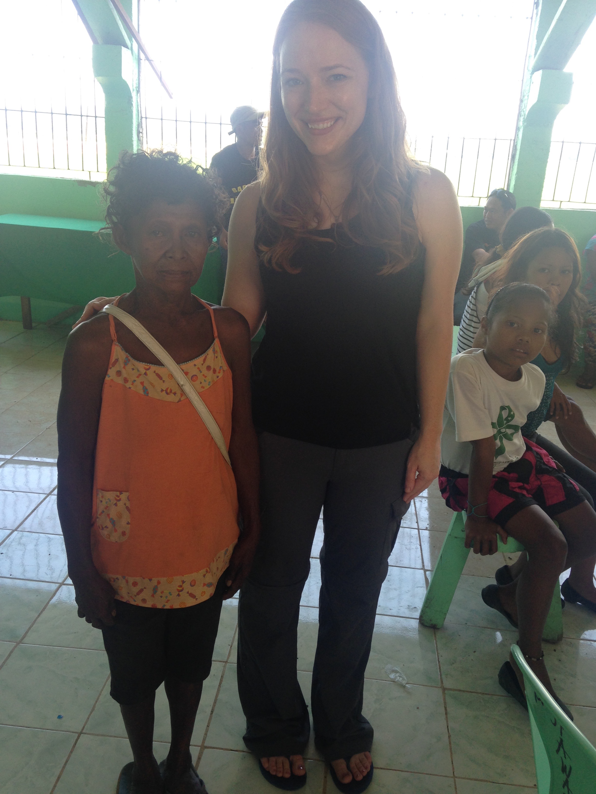 With a Mamanwa woman in the Philippines. The Mamanwa are traditionally rainforest Hunter-Gatherers.