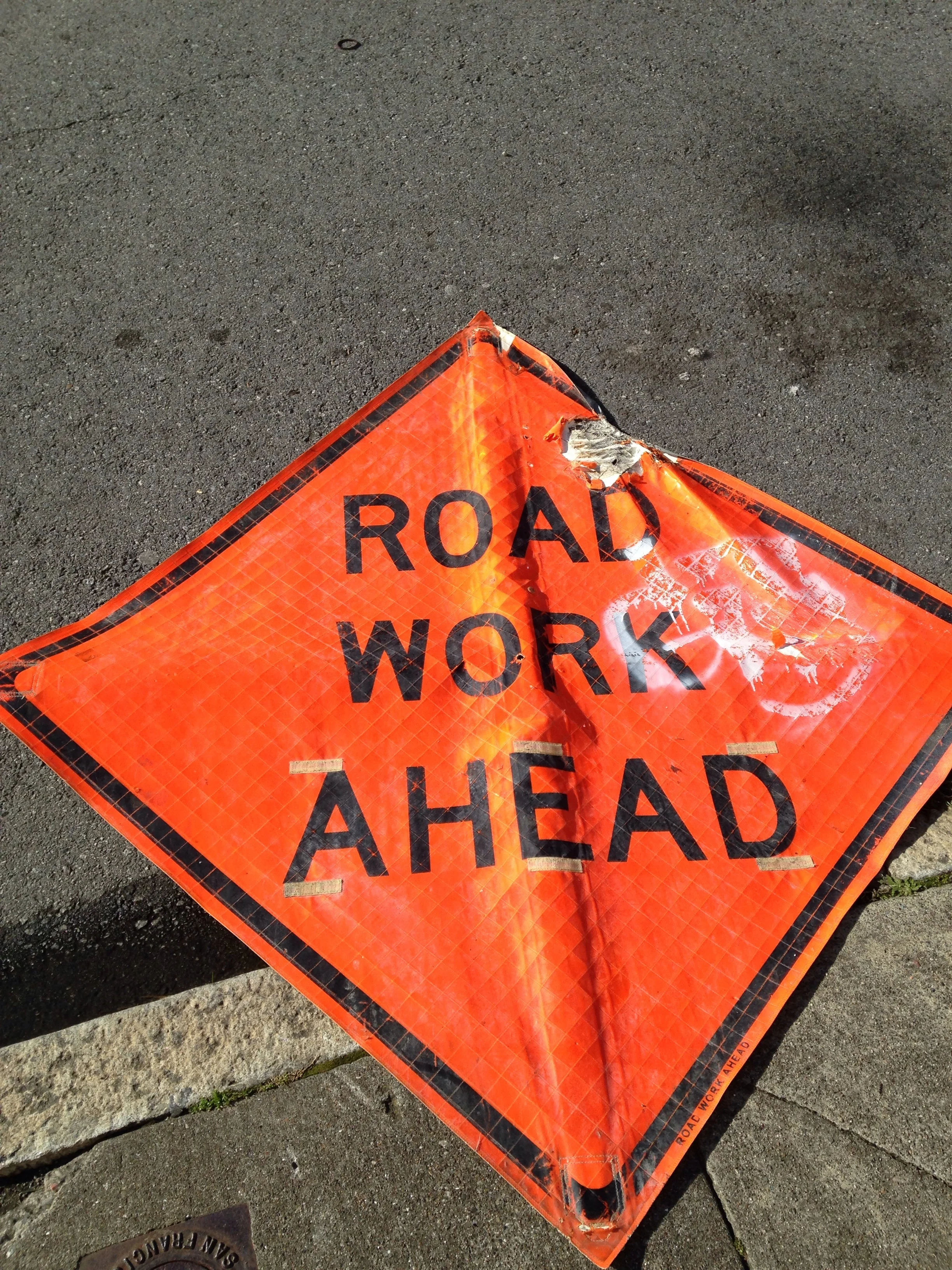 Road sign fallen into street, Geary and 23rd, San Francisco, 1:30 p.m., January, 5, 2017.