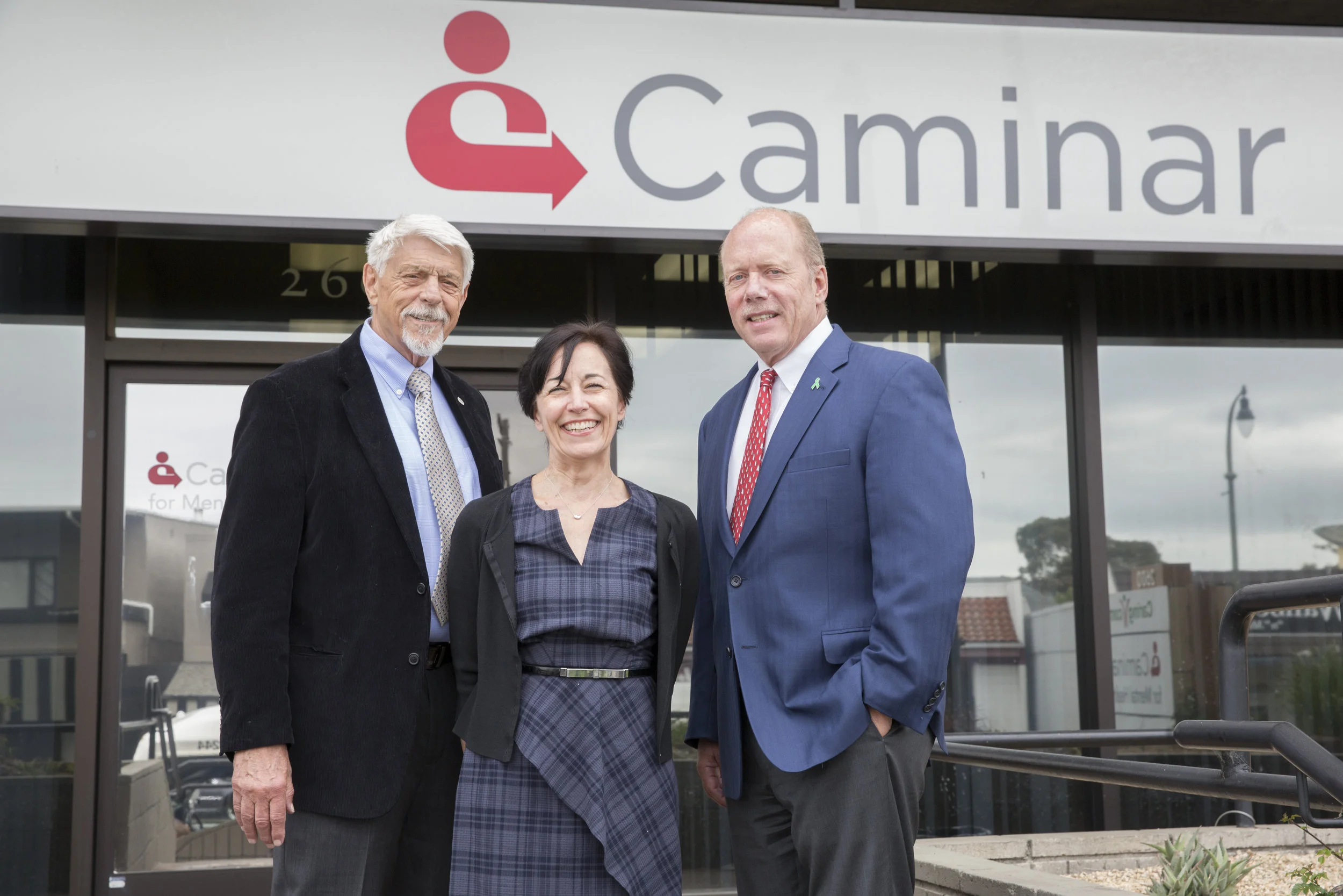 Jim Stansberry (left) of Project Ninety division, with Caminar COO Karen Gianuario and CEO Charles “Chip” Huggins