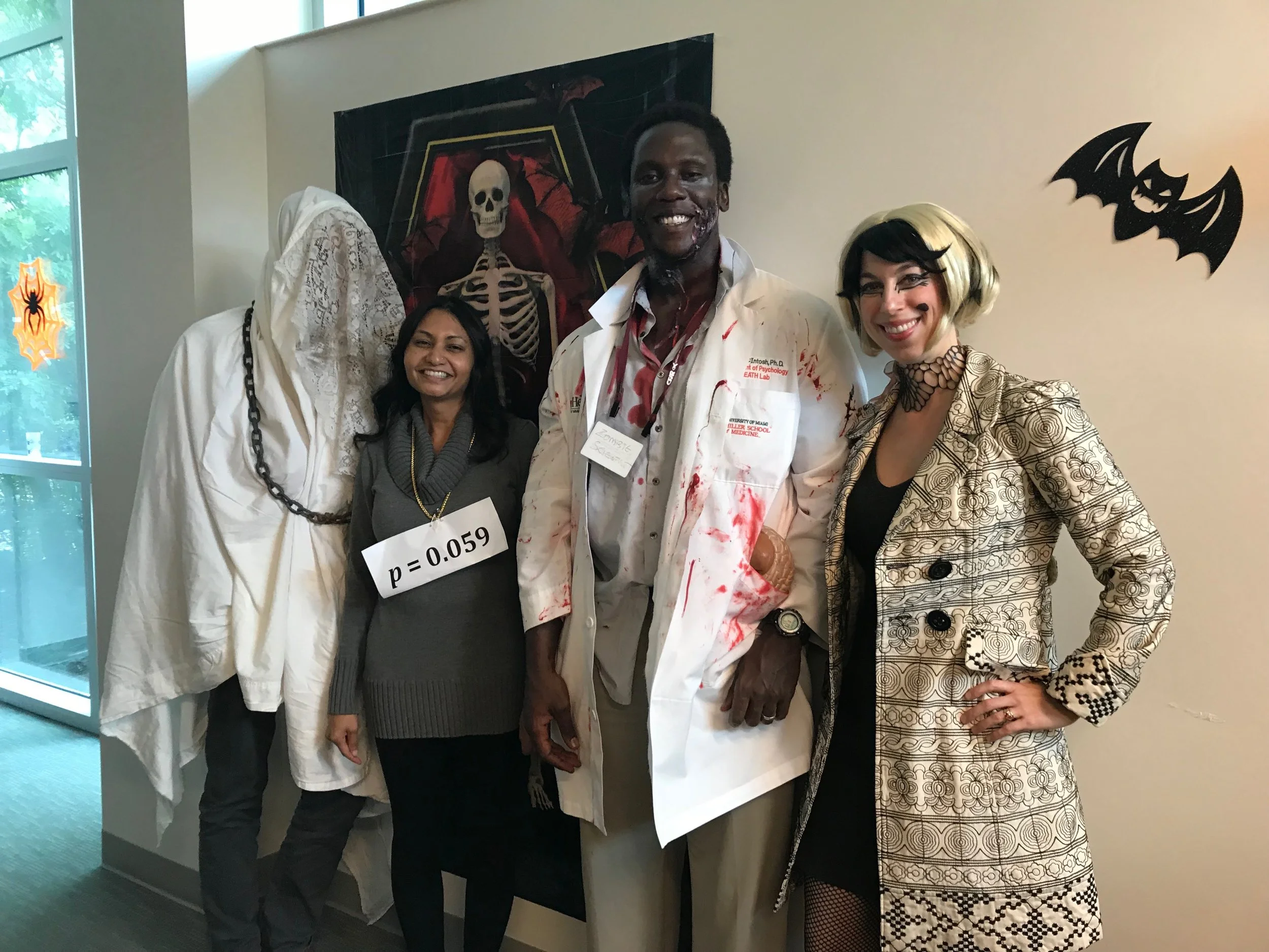Costumed CBN faculty: Dr. Aaron Heller, Dr. Lucina Uddin, Dr. Roger McIntosh, Dr. Liz Losin.