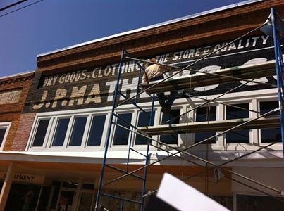 Restoring the sign at the Matthews building in downtown San Augustine. &nbsp;Image courtesy: San Augustine Main Street Program