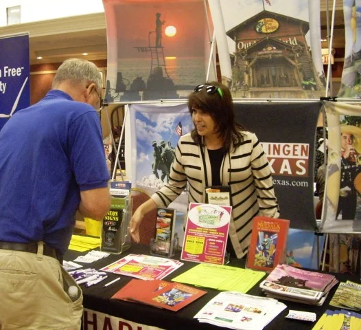 Coupons and other promotional items are distributed at the Winter Texan trade shows.