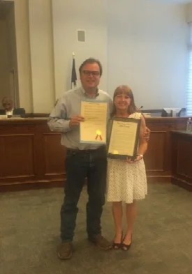Waxahachie Mayor Kevin Strength and Downtown Development Director Anita Brown with Preservation Month Resolutions