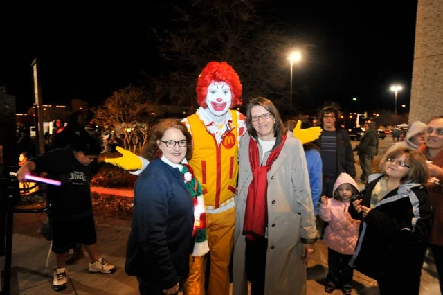 Amarillo Main Street Manager, Beth Duke (on left) and McDonald’s local owner Jill Dana (on right) pose with Ronald McDonald.