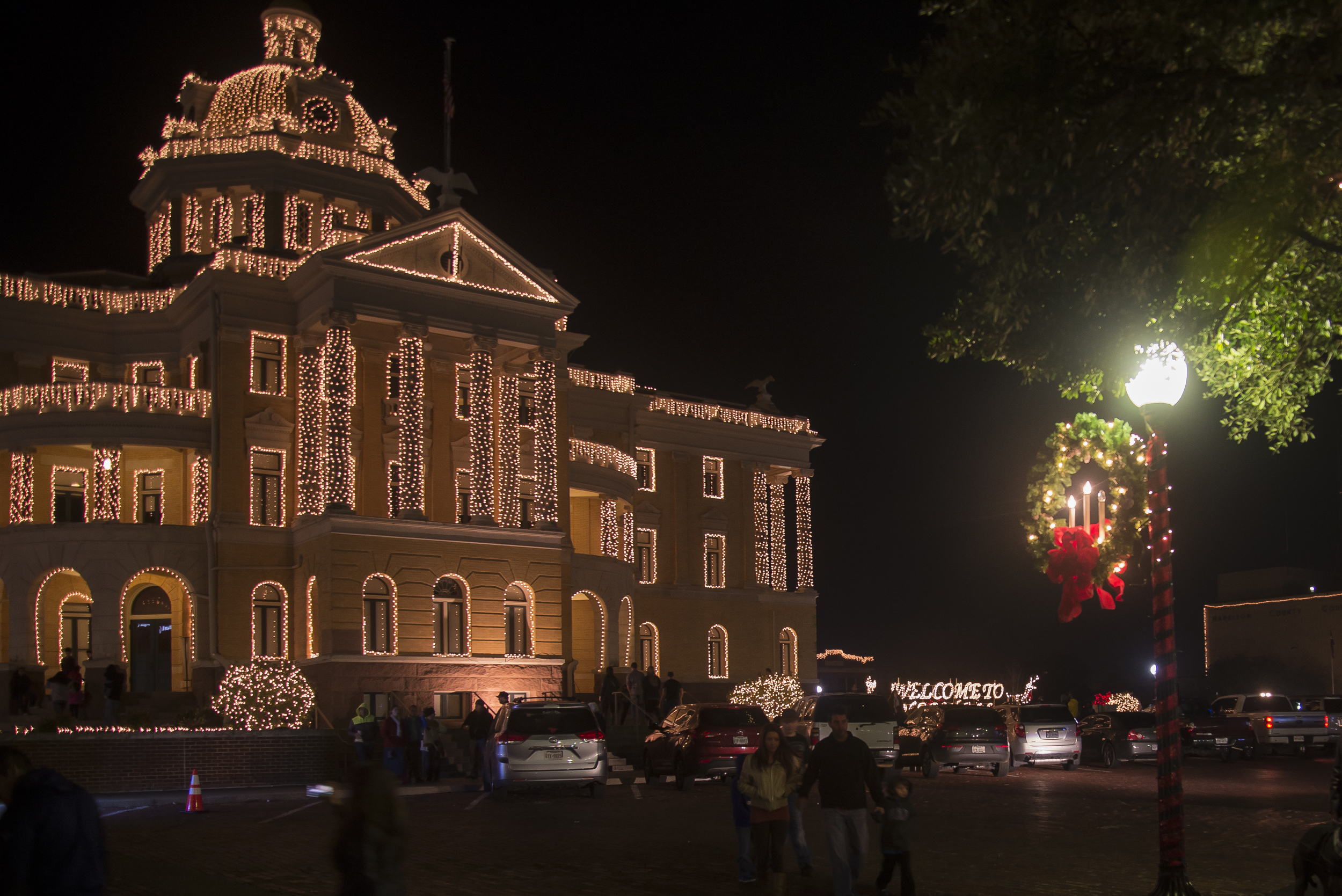 Local residents and tourists visit downtown to see the the Harrison CountyCourthouse adorned with twinkling lights and hear live, festive music.